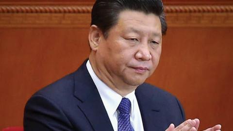 China's President Xi Jinping attends the opening session of the Chinese People's Political Consultative Conference at the Great Hall of the People on March 3, 2015 in Beijing, China.