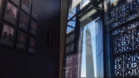 The Washington Monument as seen from inside the National Museum of African American History and Culture in Washington.