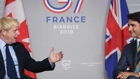 U.K. Prime Minister Boris Johnson, left, meets with Prime Minister of Canada Justin Trudeau in Biarritz, France, on Aug. 24, 2019