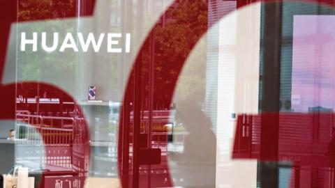 A shop for Chinese telecom giant Huawei features a red sticker reading "5G" in Beijing on May 25, 2020.
