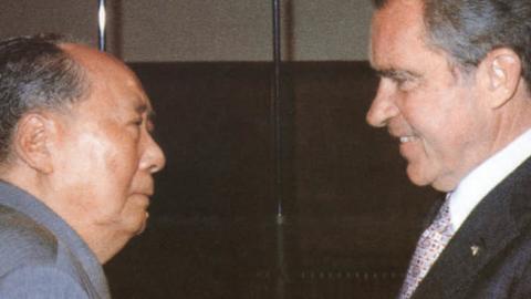 Chinese communist leader Chairman Mao Zedong (L) welcomes US President Richard Nixon, at his house in Beijing