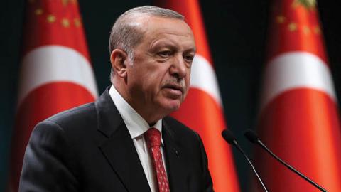 Turkish President Recep Tayyip Erdogan gestures as he delivers a speech following a cabinet meeting, in Ankara, on June 9, 2020.