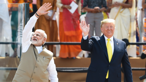 Donald Trump and Narendra Modi wave at the crowd during 'Namaste Trump' rally at Sardar Patel Stadium in Motera, on the outskirts of Ahmedabad, on February 24, 2020. (MONEY SHARMA/AFP via Getty Images)