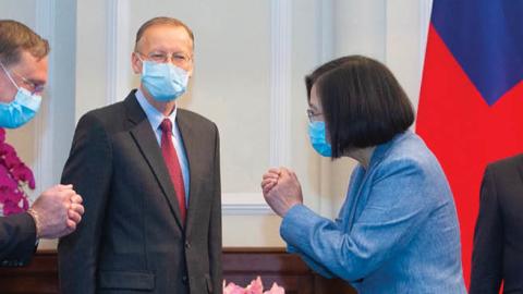 Taiwan's President Tsai Ing-wen gestures to a US official as US Secretary of Health and Human Services Alex Azar and director of the American of Institute in Taiwan, Brent Christensen, look on during their visit to the Presidential Office in Taipei 