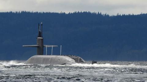 The Ohio-class ballistic missile submarine USS Pennsylvania (SSBN 735) sails toward its home port of Naval Base Kitsap after a strategic deterrent patrol