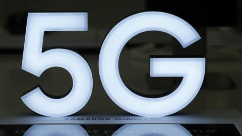 In this photo illustration a 5G logo is seen on display inside a phone store on October 01, 2020 in Paris, France