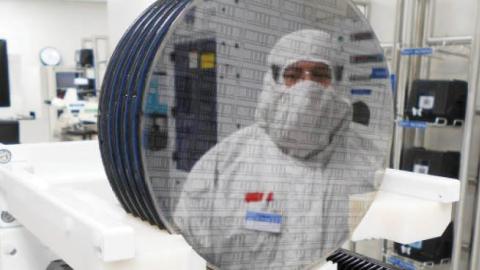 A worker at a semiconductor fabrication facility owned by Dutch chipmaker NXP Semiconductors N.V. in Chandler, Ariz., in an undated photo provided on September 29, 2020.
