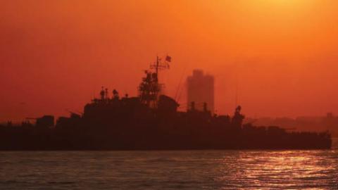 The sun sets as the Turkish Navy’s training ship TCG Cezayirli Hasan Pasa sets sail in the Marmara Sea in Istanbul, Turkey, October 12, 2020.