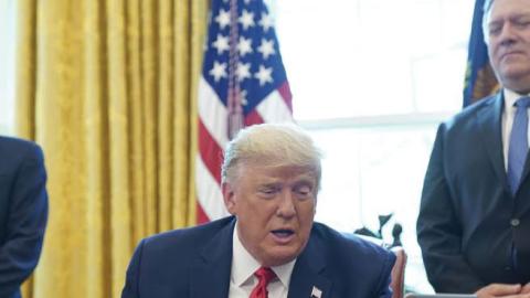 President Trump speaks on a conference call with leaders of Israel and Sudan in the Oval Office, Oct. 23.