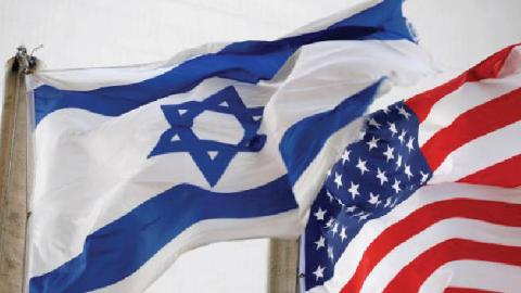 American and Israeli flags outside the U.S Embassy in Tel Aviv, Israel.