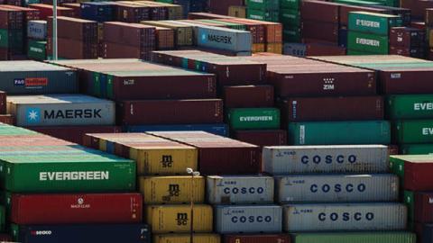 Containers stacked in COSCO owned yard in Piraeus on March 4, 2015. (Photo by NurPhoto vie Getty Images)