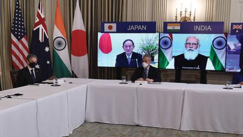 President Joe Biden, with Secretary of State Antony Blinken, meets virtually with members of the "Quad" alliance of Australia, India, Japan and the US on March 12, 2021 (Photo by OLIVIER DOULIERY/AFP via Getty Images) 