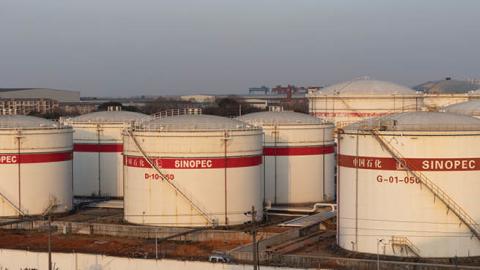 Aerial view of the China Petroleum & Chemical Corp. (Sinopec) Jiujiang oil refinery with crude oil processing capacity of 8 million tons per year on January 23, 2021 in Jiujiang, Jiangxi Province of China. (Photo by Zhang Haiyan/VCG via Getty Images)