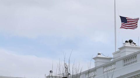 he American flag flies at half-staff at the White House in honor of the victims of Monday's mass shooting in Boulder, Colorado, on March 23, 2021 in Washington, DC (Photo by Chip Somodevilla/Getty Images) 