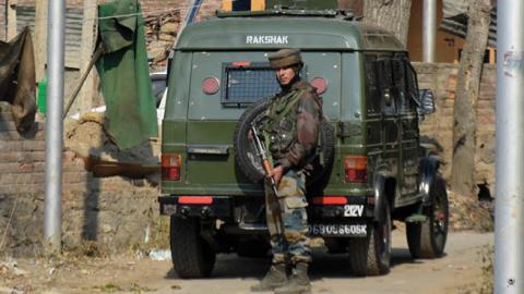 An Indian paramilitary trooper stands alert near encounter spot in Pampore area south of Srinagar, Indian Administered Kashmir on 06 November 2020 (Photo by Muzamil Mattoo/NurPhoto via Getty Images)