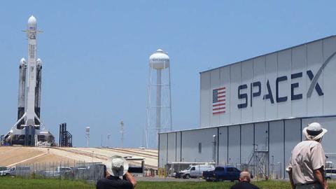 A SpaceX Falcon Heavy rocket carrying satellites for the U.S. Air Force stands ready for launch tonight at pad 39A on June 24, 2019 at Kennedy Space Center in Florida. The Space Test Program-2 mission will attempt to deliver 24 different payloads into thr