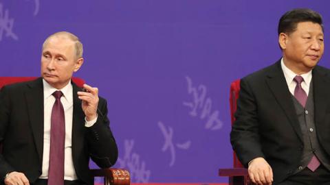 Russian President Vladimir Putin, left, and Chinese President Xi Jinping, right, attend the Tsinghua Universitys ceremony, at Friendship Palace on April 26, 2019 in Beijing, China. (Photo by Kenzaburo Fukuhara - Pool/Getty Images)