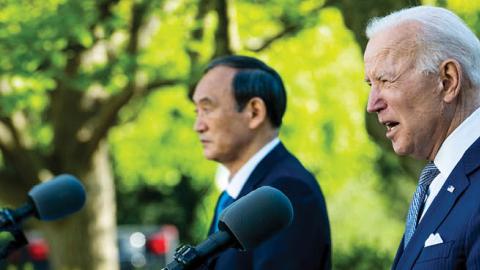 U.S. President Joe Biden and Prime Minister Yoshihide Suga of Japan hold a news conference in the Rose Garden of the White House on April 16, 2021 in Washington, DC (Photo by Doug Mills-Pool/Getty Images)