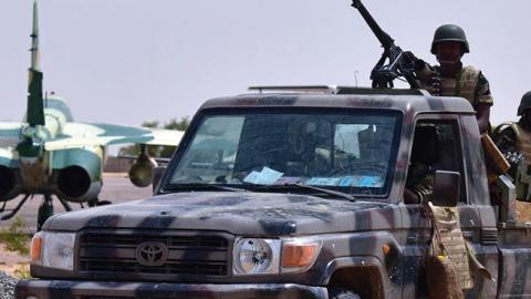 Niger's Armed Forces drive through the airport's tarmac in Diffa, southeastern Niger, as they patrol during a visit of Niger's Interior Minister on June 16, 2016 following attacks by Nigeria-based Boko Haram fighters in the region (Getty Images)