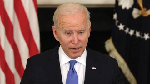 U.S. President Joe Biden speaks during an event at the State Dining Room of the White House on May 5, 2021 in Washington, DC. (Photo by Alex Wong/Getty Images)