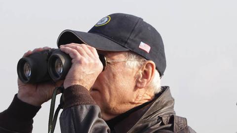 U.S. Vice President Joe Biden looks through binoculars toward North Korea during a visits to observation post Ouellette at the Demilitarized Zone (DMZ) on December 7, 2013 in Panmunjom, South Korea (Photo by Chung Sung-Jun/Getty Images)