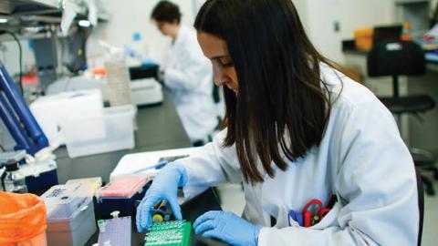 A researcher works in a lab that is developing testing for the COVID-19 coronavirus at Hackensack Meridian Health Center for Discovery and Innovation on February 28, 2020 in Nutley, New Jersey (Photo by Kena Betancur/Getty Images)