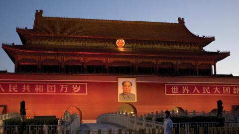  A man wearing a face mask walks in front of Tiananmen during the 31st anniversary of the June 4, 1989 crackdown on pro-democracy protests, in Beijing on June 4, 2020 (Photo by NOEL CELIS/AFP via Getty Images)