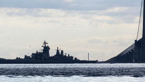 Russian battlecruiser 'Pjotr Velikij' passes the Great Belt Bridge as it leads nuclear submarine 'Dmitrij Donskoj' through the Danish waters on July 21, 2017 near Korsor, Denmark. (Photo by Ole Jensen - Corbis/Corbis via Getty Images)