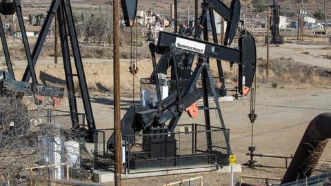 Oil pumpjacks line the horizon in Chevron's Kern River Oil Field, the fifth largest in the United States, located just north and east of Bakersfield, is viewed on July 7, 2021, in Oildale, California (Photo by George Rose/Getty Images)
