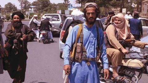  Taliban fighters patrol the streets in Herat on August 14, 2021. (AFP via Getty Images)