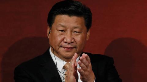 hina's President Xi Jinping applauds during his participation in the Australia China state and provincial leaders forum on November 19, 2014 in Sydney, Australia (Jason Reed - Pool/Getty Images)