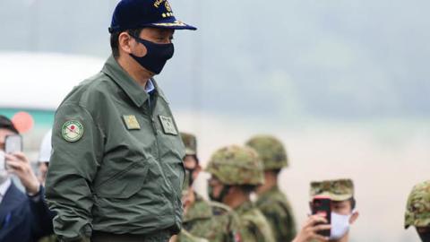 Nobuo Kishi, Japan's defense minister, attends Japan's Ground Self-Defense Forces (JGSDF) live fire exercise at JGSDF's training grounds in the East Fuji Maneuver Area on May 22, 2021 in Gotemba, Shizuoka, Japan (Photo by Akio Kon - Pool/Getty Images)