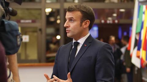 French President Emmanuel Macron speaks with journalists after the end of the second day of negotiations on the EU long term budget for 2021-2027 (Photo by Nicolas Economou/NurPhoto via Getty Images)