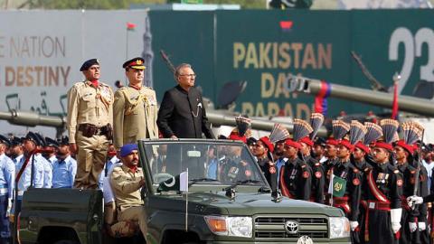 Pakistani President Arif Alvi reviews the armed forces during Pakistan Day military parade in Islamabad, capital of Pakistan, March 25, 2021. Pakistan on Thursday held the Pakistan Day military parade in Islamabad (Xinhua/Xinhua via Getty Images)