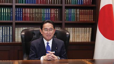 Fumio Kishida poses for a photograph following a press conference after winning the ruling Liberal Democratic Party's presidential election on September 29, 2021 in Tokyo, Japan (Photo by Du Xiaoyi - Pool/Getty Images) 