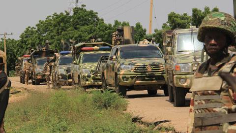 Nigerian soldiers patrol on October 12, 2019, after gunmen suspected of belonging to the Islamic State West Africa Province (ISWAP) group raided the village of Tungushe, killing a soldier and three residents. (Photo by AFP via Getty Images)