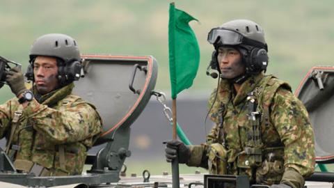 Japan's Ground Self-Defense Forces (JGSDF) soldiers during a live fire exercise at JGSDF's training grounds in the East Fuji Maneuver Area on May 22, 2021 in Gotemba, Shizuoka, Japan. (Photo by Akio Kon - Pool/Getty Images)