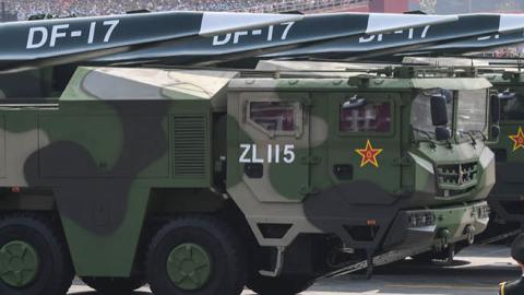 Military vehicles carrying DF-17 missiles participate in a military parade at Tiananmen Square in Beijing on October 1, 2019. (GREG BAKER/AFP via Getty Images)