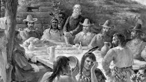 A painting depicts the first Thanksgiving. (Photo by H. Armstrong Roberts/ClassicStock/Getty Images)