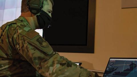 U.S. Air Force Maj. Nicholas Tensing monitors a computer in support of the Advanced Battle Management System Onramp 2 on Sept. 2, 2020 at Joint Base Andrews, Maryland. (Senior Airman Daniel Hernandez/U.S. Air Force)