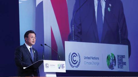 South Korea's President Moon Jae-in speaks during the UN Climate Change Conference COP26 at SECC on November 1, 2021 in Glasgow, United Kingdom. (Photo by Yves Herman - WPA Pool/Getty Images)