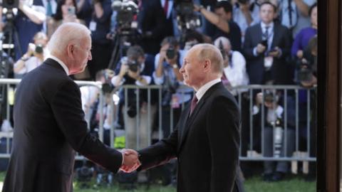 U.S. President Joe Biden and Russia's President Vladimir Putin shake hands as they meet for talks at the Villa La Grange on June 16, 2021. (Photo by Mikhail Metzel\TASS via Getty Images)