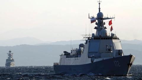 Ships belonging to the Chinese naval fleet pass through a naval mine threat area during the Joint Sea-2021 China-Russia military drill near Vladivostok, Russia on October 15, 2021. (Photo by Sun Zifa/China News Service via Getty Images)