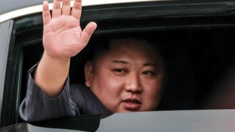 Kim Jong-un waves from his car after arriving by train at Dong Dang railway station near the border with China on February 26, 2019 in Lang Son, Vietnam. (Photo by Linh Pham/Getty Images)