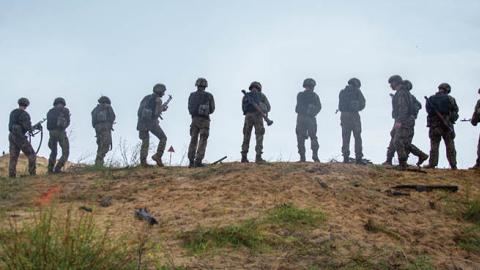 Ukrainian Marines consolidate on a range during Exercise Sea Breeze 21 in a nondisclosed location on July 5, 2021. (U.S. Marine Corps)
