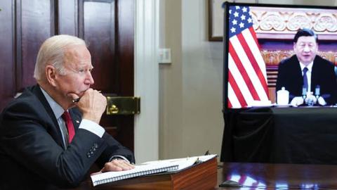 U.S. President Joe Biden meets with Chinese Leader Xi Jinping during a virtual summit from the Roosevelt Room of the White House in Washington, DC, November 15, 2021. (Photo by MANDEL NGAN/AFP via Getty Images)