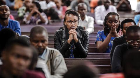 Catholics pray during Sunday mass at Holy Family Minor Basilica in Nairobi, Kenya on March 22, 2020. (Photo by LUIS TATO/AFP via Getty Images)