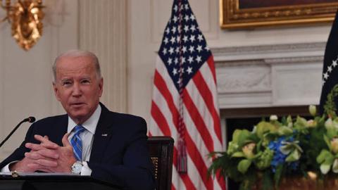 President Joe Biden speaks during a meeting in the State Dining Room of the White House in Washington, DC, on January 26, 2022. (Photo by Nicholas Kamm/AFP via Getty Images)