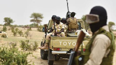 Niger Army armed forces patrol during a visit of Niger's Interior Minister to a camp for displaced populations near Diffa on June 16, 2016 following attacks by Boko Haram fighters in the region. (Issouf Sanogo/AFP via Getty Images)