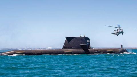 Royal Australian Navy submarine HMAS Rankin conducts helicopter transfers during a training assessment on February 12, 2021 in Cockburn Sound, Australia. (Photo by LSIS Richard Cordell/Australian Defence Force via Getty Images)